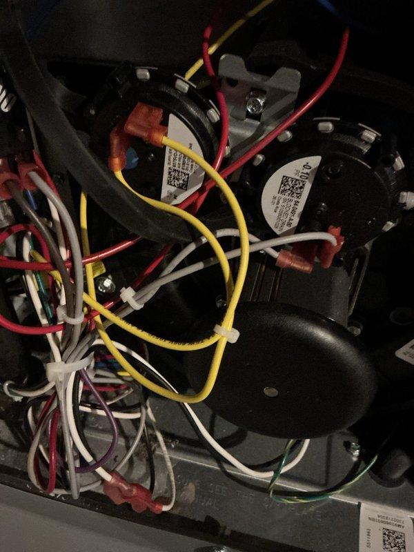 Performed comprehensive heating tune-up on dual furnace system. Inspected and verified proper electrical connections and wiring integrity at control board and motor assemblies. Examined air filtration system, noting pleated filter media condition and proper installation within housing compartment.