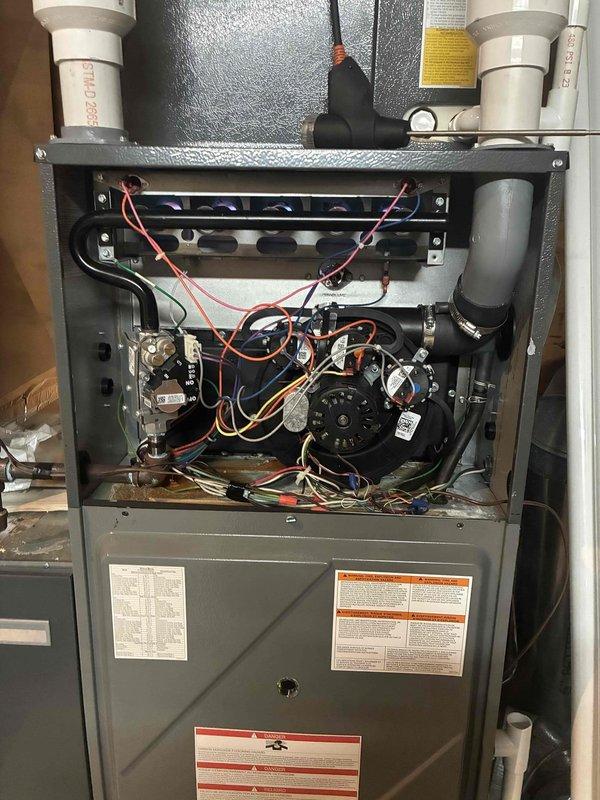 Performed comprehensive heating tune-up on furnace system, including inspection of internal components, blower motor, and electrical connections. Conducted combustion analysis using Testo 310 analyzer, which confirmed proper operation with good combustion efficiency (94.5%) and acceptable CO2/O2 levels. All systems functioning normally with no issues detected.