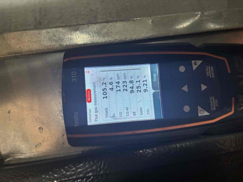 Performed comprehensive heating tune-up on furnace system, including inspection of internal components, blower motor, and electrical connections. Conducted combustion analysis using Testo 310 analyzer, which confirmed proper operation with good combustion efficiency (94.5%) and acceptable CO2/O2 levels. All systems functioning normally with no issues detected.