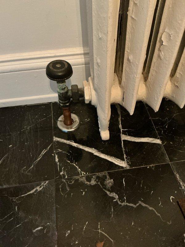 Conducted follow-up assessment of existing radiator system per client request. Documented condition of multiple cast iron radiators showing age-related deterioration, including chipping paint and worn valve components. Prepared quotation for replacement radiator valves as part of planned boiler replacement project.