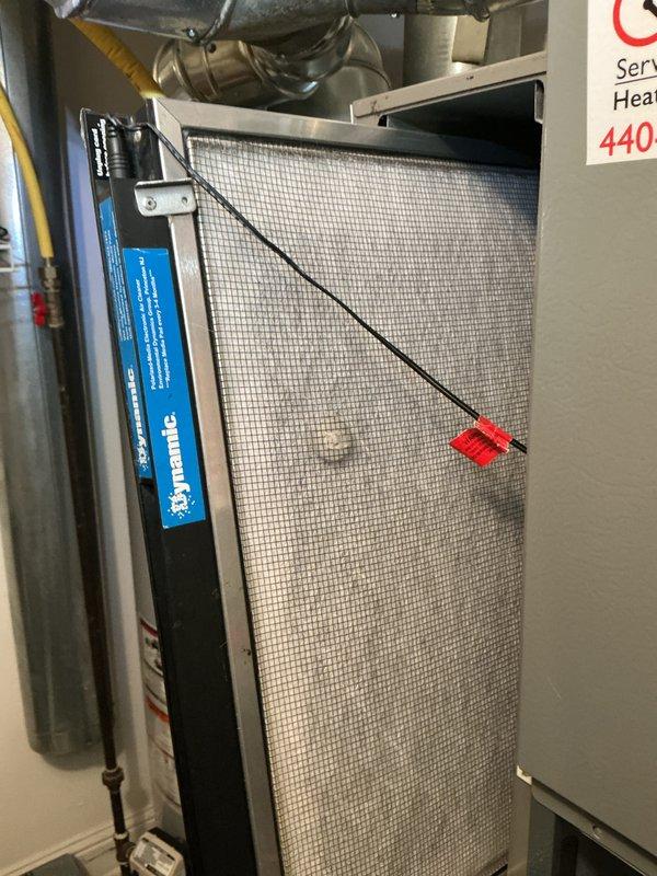 Performed scheduled monthly heating maintenance service on HVAC system. Inspected air filter (Dynamic brand) and verified proper installation with safety switch connection intact. Examined gas line assembly with shut-off valve and insulated piping, confirming all components are in good working condition with no issues detected.