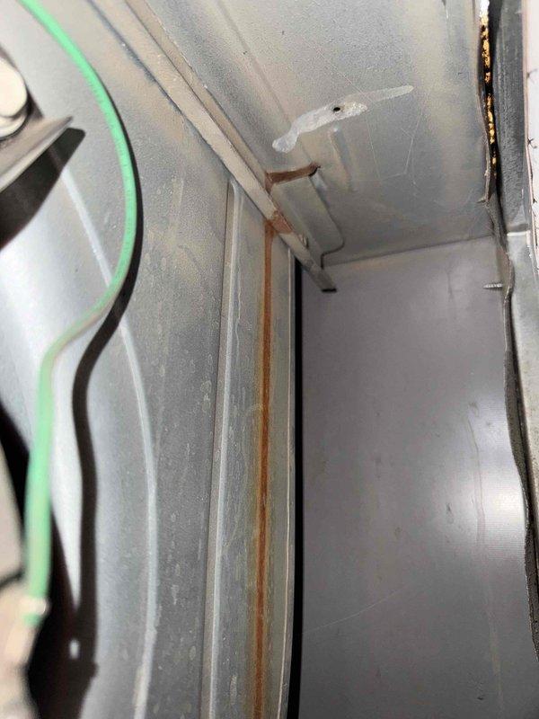 Responded to emergency call for furnace with active water leak. Diagnosed condensate drain blockage causing water accumulation inside unit. Cleared obstruction and confirmed proper drainage, restoring normal operation with heat functioning correctly.