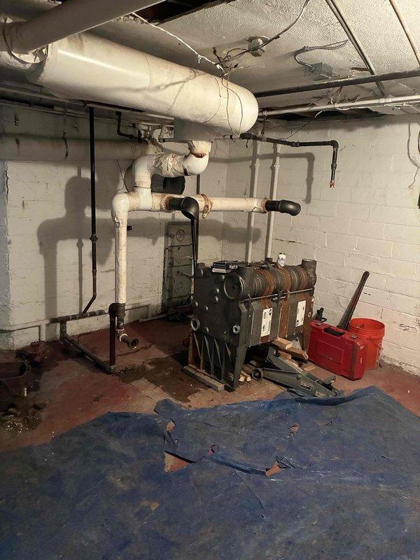 Successfully completed installation of a new Peerless boiler system in basement mechanical room. Installed all necessary plumbing connections including PVC piping network and properly mounted the Honeywell Vaporstat pressure control device. System was tested and verified operational with all controls properly calibrated.