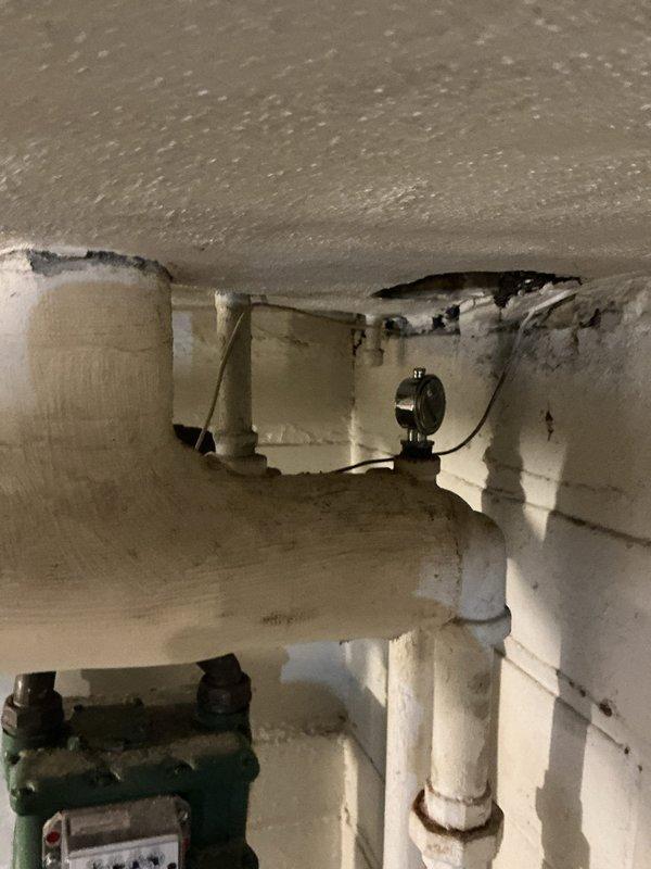 Completed replacement of two Hofman units and performed a 3-foot pipe repair in basement utility area. Installed new PVC piping with proper 90-degree connections to existing black pipe fittings, secured with appropriate sealant. Addressed damaged sections showing gaps and deterioration at connection points, restoring system integrity and functionality.