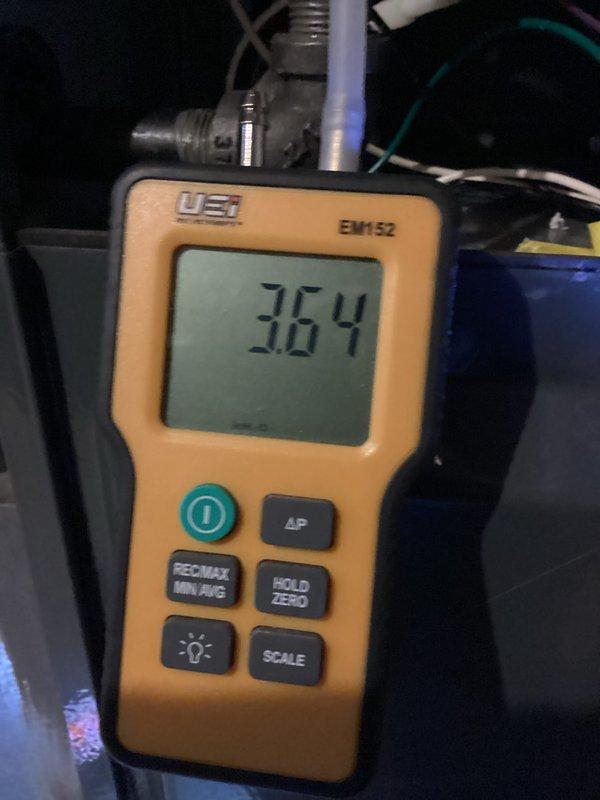 Performed scheduled monthly heating maintenance on two systems. Conducted electrical measurements using UEi EM152 meter, recording static pressure reading of 36.4, and utilized UEi G2 Phoenix multimeter to verify electrical parameters (0.40A, 0.118V). All systems operating within specifications after service.