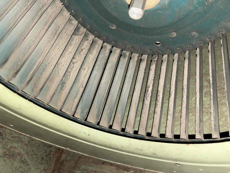 Performed routine tune-up on approximately 20-year-old furnace. Inspected and cleaned blower wheel assembly which showed accumulated dust between fins. Examined gas piping connections and fittings for proper installation and function. System operational after service.