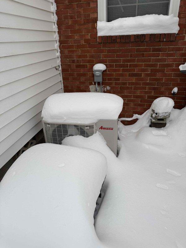 Completed replacement of non-functioning communicating thermostat to restore heating system operation. Inspected outdoor unit which was heavily covered in snow, and verified electrical connections at the Mars disconnect box. System functioning properly after installation.