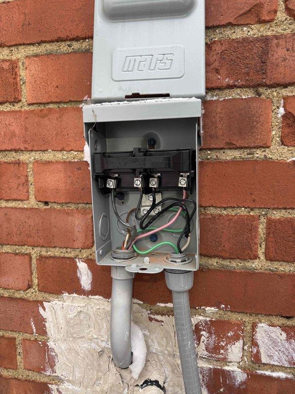 Completed replacement of non-functioning communicating thermostat to restore heating system operation. Inspected outdoor unit which was heavily covered in snow, and verified electrical connections at the Mars disconnect box. System functioning properly after installation.