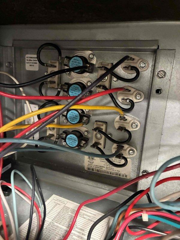 Performed scheduled maintenance service on client's boiler system. Inspected electrical control panel containing temperature sensors/thermostats and verified proper wiring connections. Examined AirBoss furnace unit, checked digital control displays, and confirmed all components were functioning within normal operating parameters.