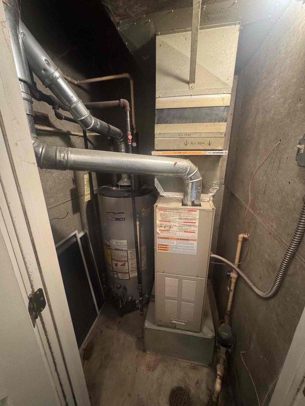 Performed scheduled heating tune-up on gas furnace system located in basement utility room. Discovered significant dust and debris accumulation on blower assembly affecting operational efficiency. Thoroughly cleaned blower wheel and housing to restore proper airflow and system performance.