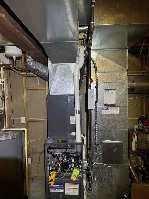 Responded to no heat complaint at residence following previous service call. Performed diagnostic testing with manometer on Goldsworth furnace system, obtaining pressure reading of 0.749. Inspected internal components including wiring, fan assembly, and control board. Serviced unit to restore proper heating function.