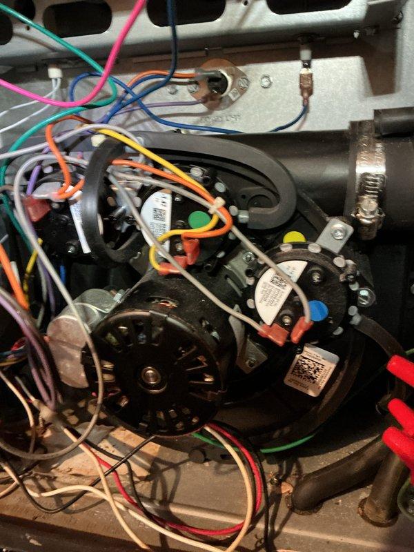 Performed routine monthly heating maintenance service on HVAC system. Inspected blower motor assembly and electrical components, checking all wire connections and terminal points. Conducted diagnostic testing of control board and electrical circuits using multimeter to ensure proper system operation.