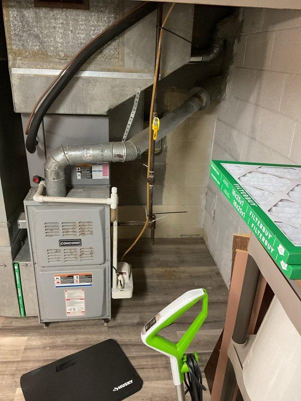 Performed routine heating maintenance on Concord furnace system. Completed full inspection of interior components including blower motor, circuit board connections, and condensate drainage system. All systems functioning properly with no issues identified.