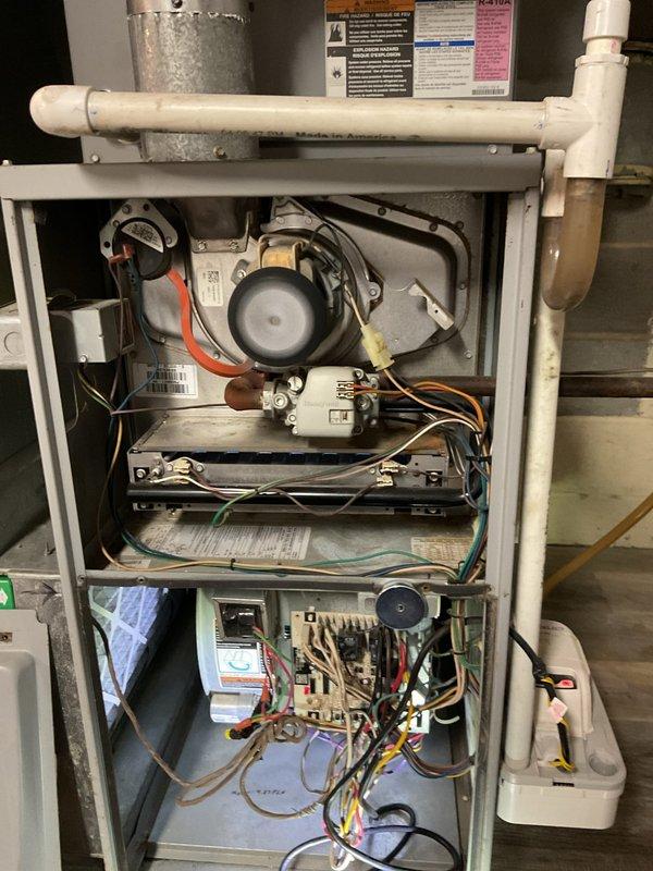 Performed routine heating maintenance on Concord furnace system. Completed full inspection of interior components including blower motor, circuit board connections, and condensate drainage system. All systems functioning properly with no issues identified.