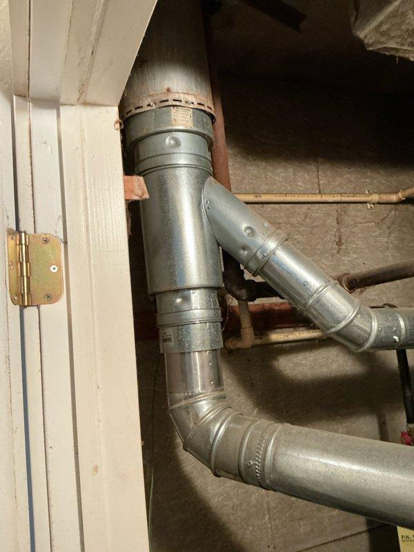 Conducted comprehensive evaluation of existing furnace system for potential replacement options. Inspected galvanized ductwork connections, junction points, and electrical components including junction box and associated wiring. Documented current installation configuration to develop appropriate replacement recommendations.
