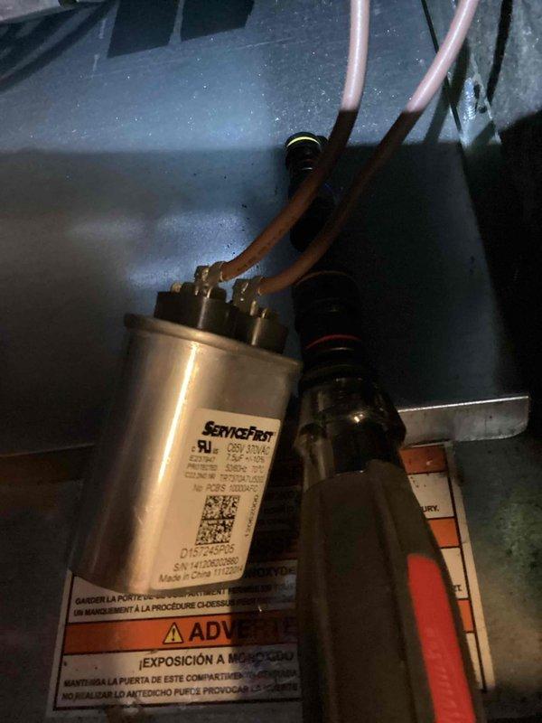 Performed scheduled monthly heating maintenance service on HVAC system. Inspected ServiceFirst capacitor connections and pressure switch assembly for proper operation. Examined blower wheel assembly for dust accumulation and verified proper rotation with minimal wear on the squirrel cage fins.