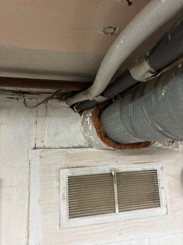 Conducted assessment of aging furnace system for replacement options. Observed significant corrosion on supporting hardware and ductwork components. Exterior Rheem condensing unit was snow-covered and will need evaluation once weather permits. Homeowners acknowledged system replacement need since purchasing property last year.