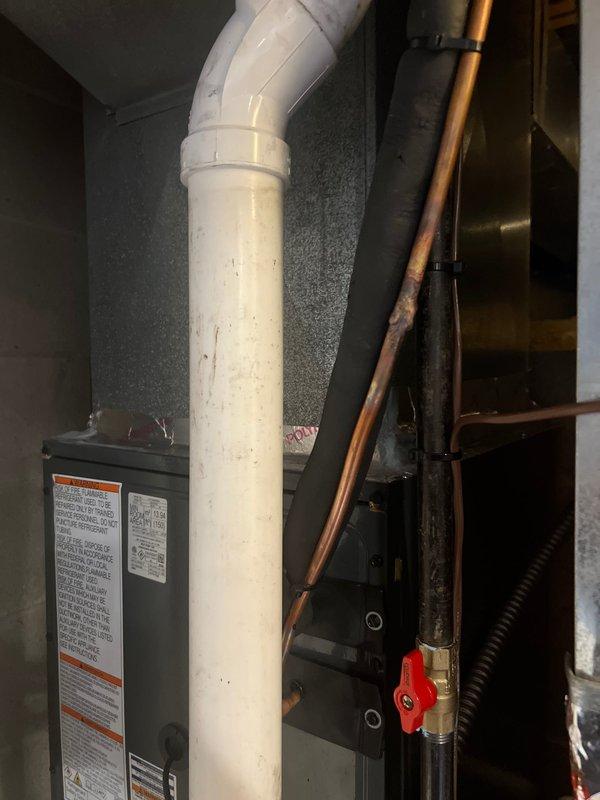 Completed installation of a new 96% efficiency furnace with matching air conditioning system and humidifier. System was properly set up with appropriate condensate drainage using PVC piping, and copper refrigerant lines were installed with service valves for future maintenance. All components were verified operational and system performance was confirmed before completing the job.