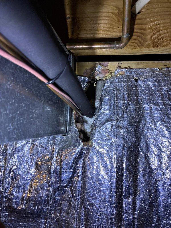 Conducted comprehensive inspection of basement utility area for furnace replacement options. Evaluated existing HVAC infrastructure including sump pump system and associated plumbing. Documented current insulation conditions, noting damaged foil-faced insulation and copper piping configuration for replacement planning considerations.