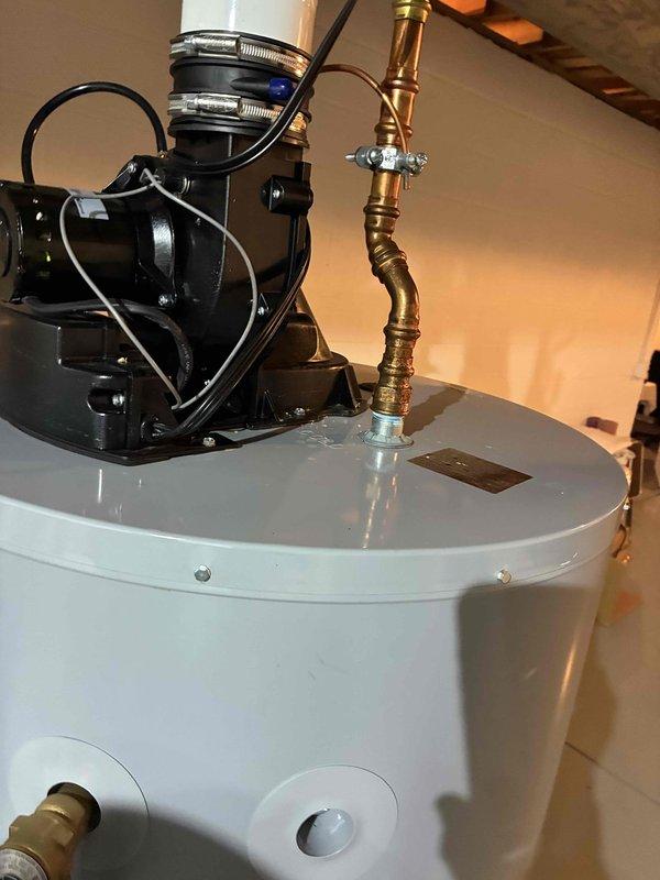 Performed scheduled monthly heating maintenance service. Conducted inspection of water heater system, verifying proper installation and connection integrity. Completed combustion analysis using Testo 310 analyzer, confirming optimal operation with readings of 942/99, indicating efficient system performance within manufacturer specifications.