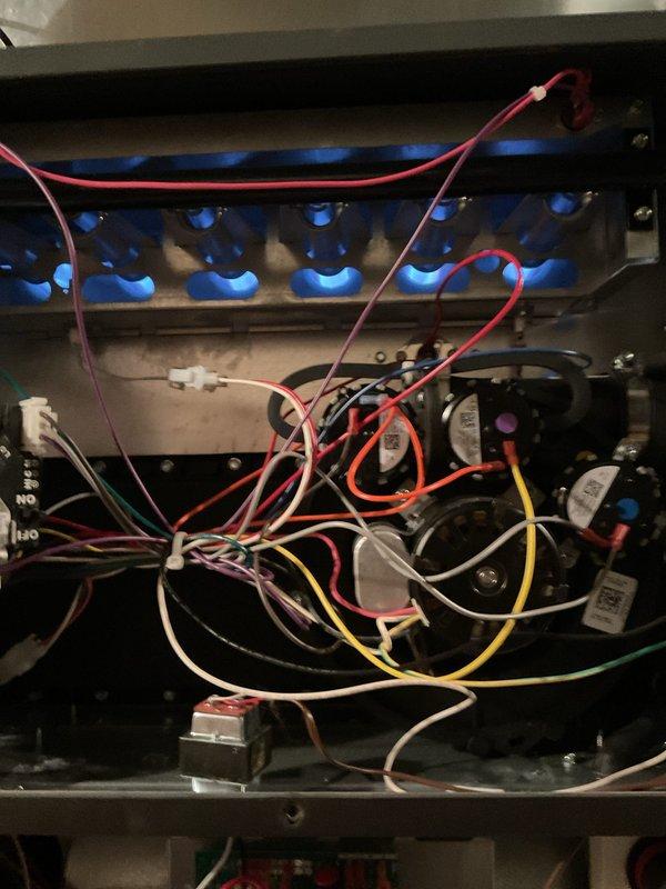 Performed annual maintenance service on residential furnace system. Inspected gas burner assembly and verified proper flame pattern and operation. All electrical components, control boards, and wiring connections were examined and found to be in good working condition with no issues detected.
