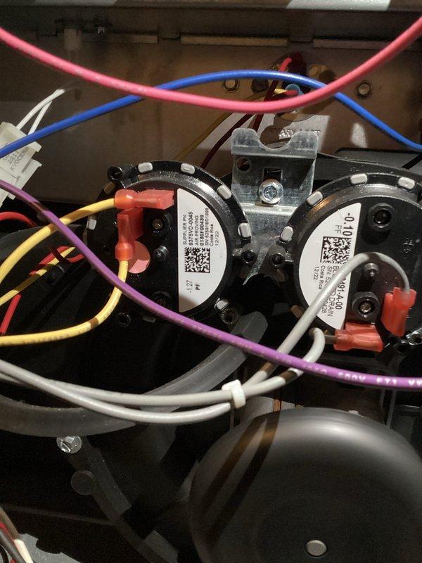 Performed monthly heating maintenance service on HVAC system. Inspected pressure switches and electrical connections, confirming proper wire terminations and component mounting. Conducted electrical testing with clamp meter, verifying normal operating parameters (35.9V/87.5V) for system functionality.