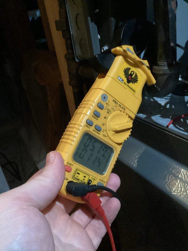 Performed monthly heating maintenance service on HVAC system. Inspected pressure switches and electrical connections, confirming proper wire terminations and component mounting. Conducted electrical testing with clamp meter, verifying normal operating parameters (35.9V/87.5V) for system functionality.