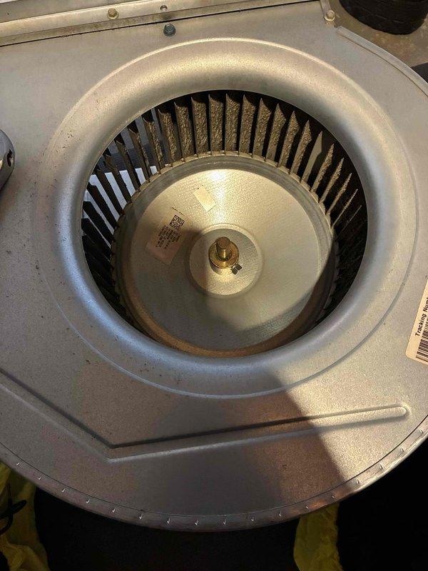 Performed secondary service call for blower wheel cleaning on HVAC system. Removed blower assembly from housing, cleaned accumulated dust and debris from fan blades and housing components, and reinstalled properly. Verified proper operation after service completion.