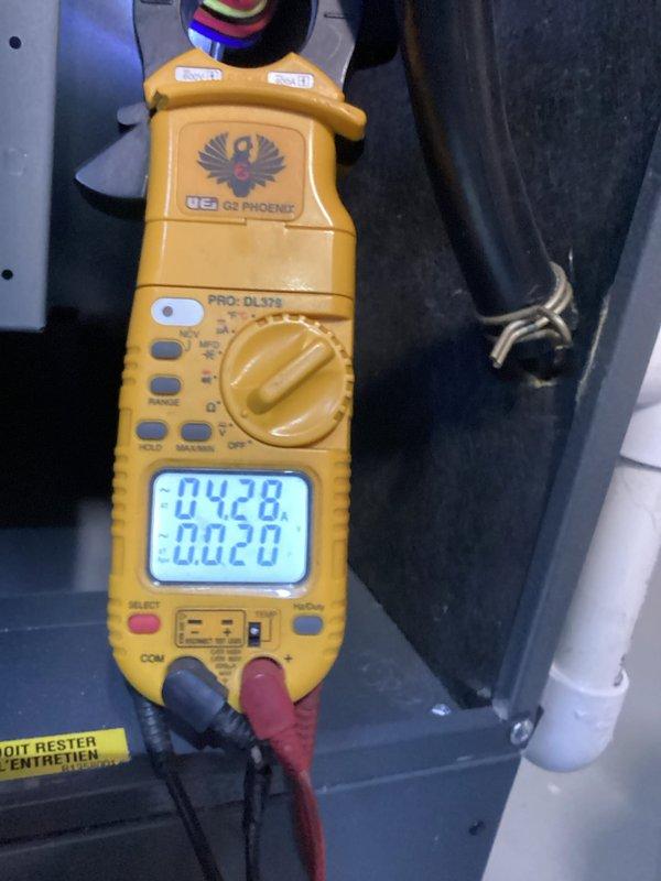 Performed routine heating maintenance service on system. Conducted electrical measurements using UEi G2 Phoenix clamp meter to verify proper current draw and voltage values. Inspected interior components including pressure switch, gas lines, and electrical connections - all found to be in normal working condition with no issues detected.