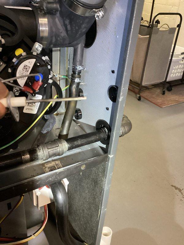 Performed routine heating maintenance service on system. Conducted electrical measurements using UEi G2 Phoenix clamp meter to verify proper current draw and voltage values. Inspected interior components including pressure switch, gas lines, and electrical connections - all found to be in normal working condition with no issues detected.