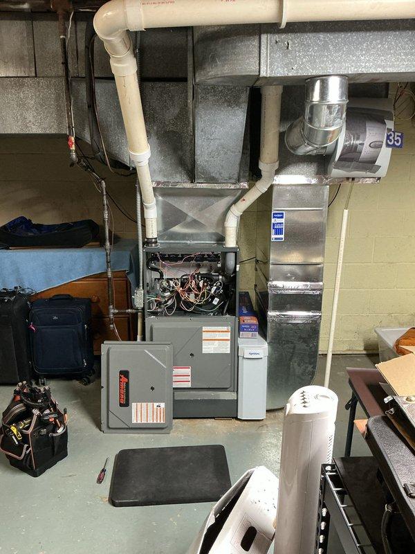 Responded to service call for furnace not keeping up with thermostat setpoint. Inspected system and found thermostat was functioning properly, showing correct indoor temperature of 71° with 35% humidity. Checked humidistat settings and adjusted from near-OFF position to appropriate seasonal setting. Unit now maintaining desired temperature.