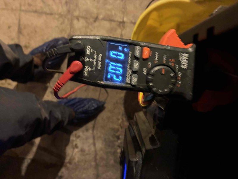 Responded to service call for Weil McLain WM97-155 boiler with suspected Low Water Cutoff issue. Performed electrical diagnostics using multimeter and clamp meter, measuring voltage at circulator pump (0.41A reading). Identified and resolved electrical connection issue at the pump assembly on the primary loop.