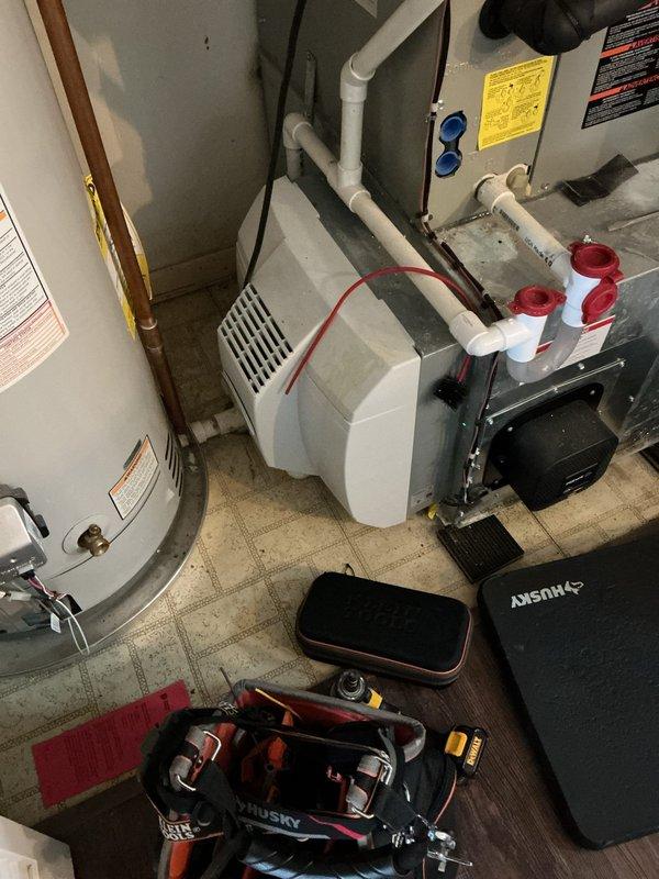 Performed annual heating maintenance on a gas furnace that is approximately 12-15 years old based on visual inspection. Observed proper flame pattern during operation with no signs of delayed ignition. Inspected electrical connections, burner assembly, and ventilation system - all components functioning within acceptable parameters despite age of unit.