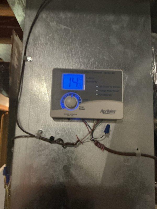 Completed scheduled heating maintenance on multiple HVAC systems. Inspected and verified proper operation of Aprilaire humidifier control system. Checked Weil-McLain boiler system, confirming proper heating function with operating temperature of 127°F and normal pressure readings.