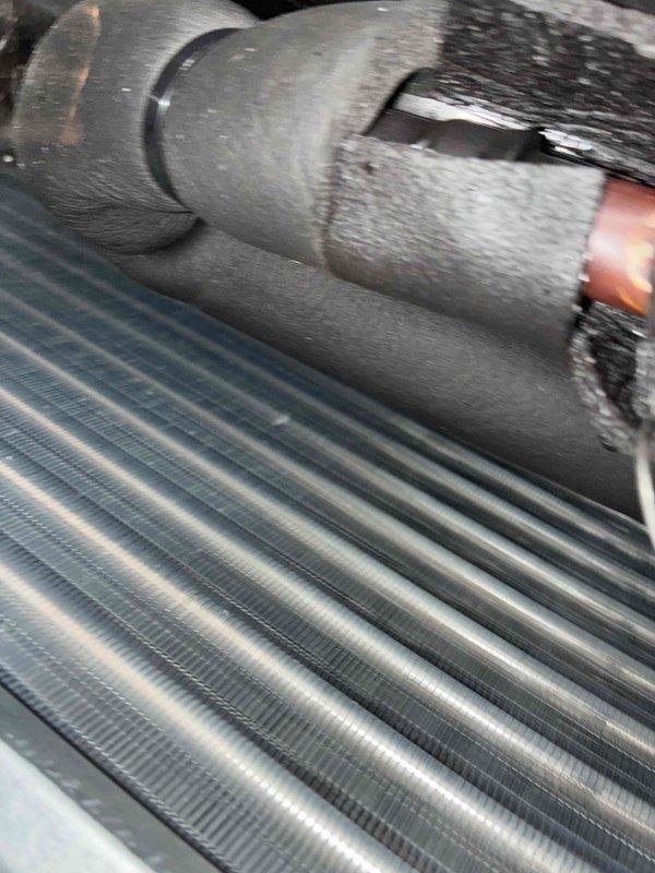 Performed monthly heating maintenance service on HVAC system. Conducted visual inspection of heat exchanger components and connections, noting some dust accumulation on cylindrical fittings. Completed electrical diagnostic testing using clamp meter, confirming proper amperage draw of 4.15 amps within manufacturer specifications.