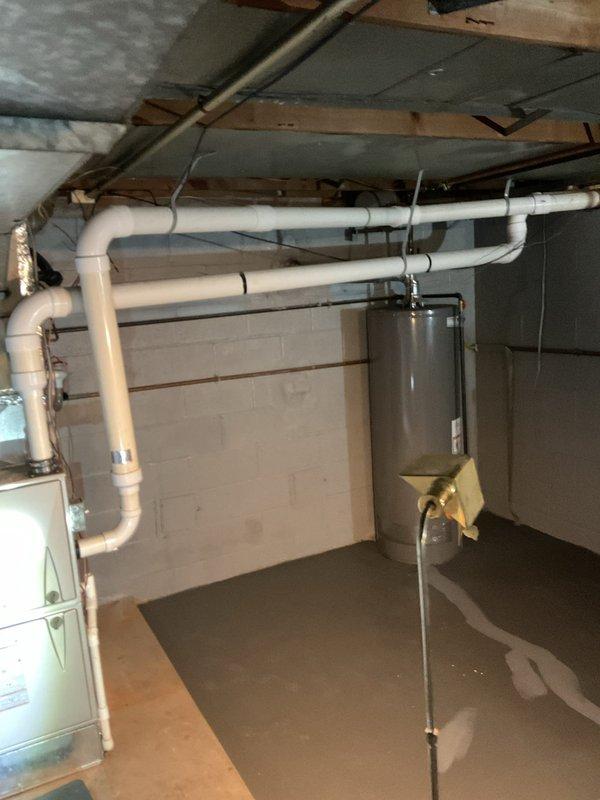 Performed routine furnace maintenance service, inspecting the heating system components located in the utility area. Verified proper operation of the furnace and checked system pressure readings, which were within normal operating parameters. All connections and ductwork were examined and found to be in satisfactory condition.