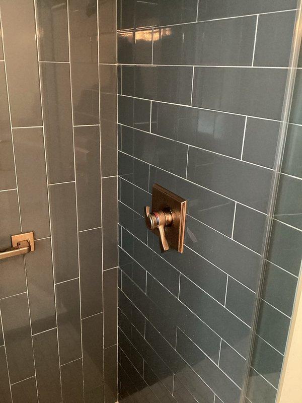 Responded to customer complaint regarding insufficient hot water supply from recently installed tank water heater. Customer reported hot water depletion after single shower use with extended recovery time of several hours. Conducted visual inspection of shower fixtures and confirmed proper installation with no visible leaks. Diagnosed issue as undersized tank capacity for household demand. Adjusted temperature settings and recommended potential upgrade to higher capacity unit if problem persists.