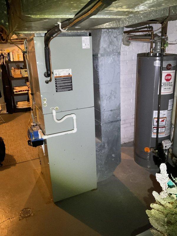 Conducted routine heating maintenance on a residential furnace system. Inspected burner assembly, electrical components, and PVC exhaust piping for proper operation. All systems functioning normally with no issues identified.