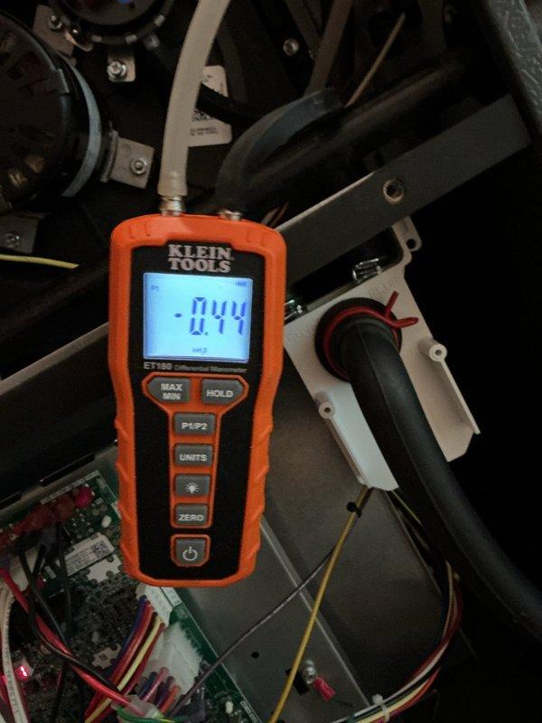 Responded to no-heat call and found pressure switch issue. Performed manometer testing which revealed negative pressure reading of -0.44, indicating restricted airflow or improper venting. Restored system operation by addressing pressure switch circuit and confirming proper ignition sequence.