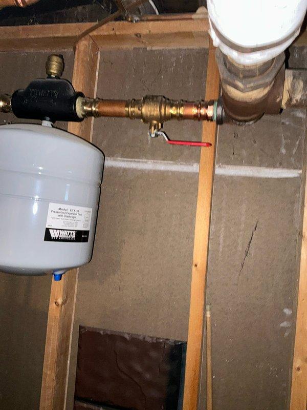Conducted boiler assessment at residential property, examining existing Weil-McLain heating unit and associated plumbing components. Evaluated condition of copper piping, expansion tank, and valve connections. Provided customer with various boiler replacement options based on system requirements and current installation configuration.