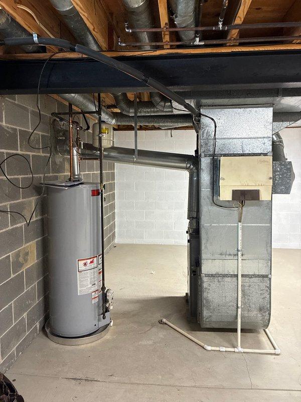Conducted comprehensive assessment of existing HVAC system in customer's basement per customer request. Inspection revealed aging furnace experiencing operational issues that warrant replacement. Documented current setup including furnace unit, ductwork configuration, and adjacent water heater to prepare accurate replacement estimate. System evaluation complete and replacement options prepared for customer review.