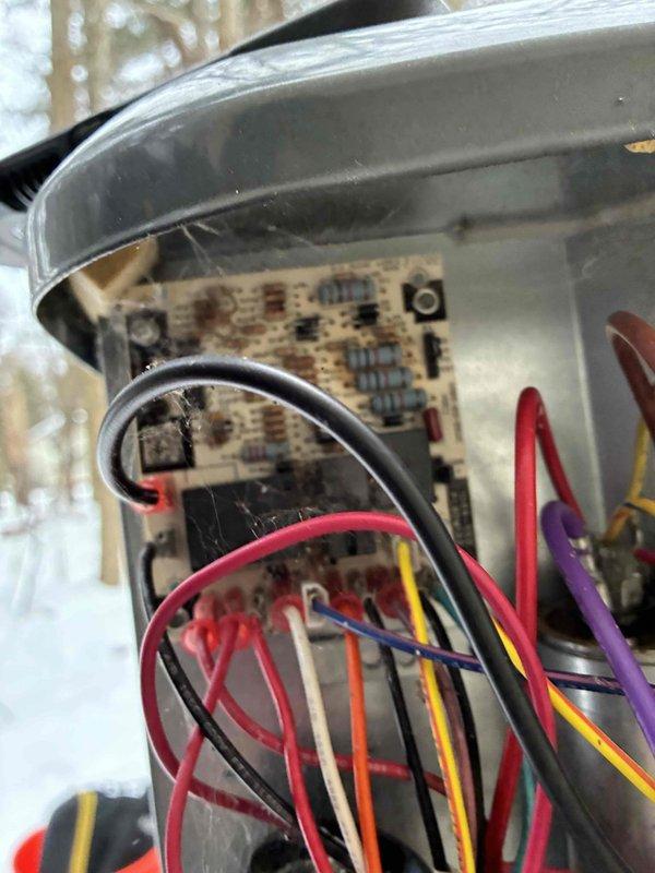 Performed heating maintenance inspection on system. Found circuit board with dust accumulation and cobwebs requiring cleaning. Verified proper operation with temperature readings of 25°F on external components.