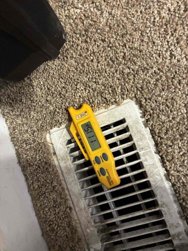 Performed heating tune-up on system and inspected air scrubber issue. Temperature readings at floor register measured 75.1°F with digital probe. Visual inspection of furnace and adjacent water heater in mechanical room completed with all components functioning properly.