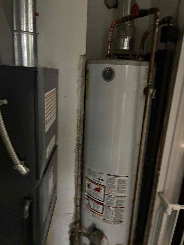 Performed heating tune-up on system and inspected air scrubber issue. Temperature readings at floor register measured 75.1°F with digital probe. Visual inspection of furnace and adjacent water heater in mechanical room completed with all components functioning properly.