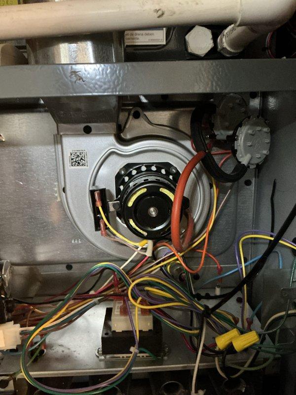 Performed annual preventative maintenance service on furnace as part of scheduled SPP maintenance agreement. Inspected and verified proper connections of blower motor assembly wiring. All electrical components were examined, with particular attention to terminal connections and wire routing integrity within the main housing.