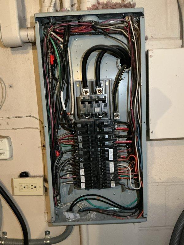Conducted comprehensive electrical inspection of the main service panel, examining breaker conditions, wire connections, and load distribution. Inspected exterior meter installation and associated conduit, verifying proper weatherproofing and code compliance. All components appear properly installed with no immediate safety concerns identified.