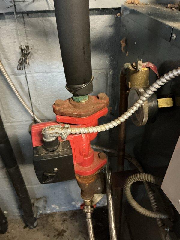 Performed routine heating maintenance service on dual-system installation. Inspected and verified proper operation of circulation pump assembly and electrical connections. Systems functioning normally with no issues identified.
