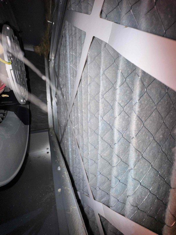 Performed monthly contract maintenance on heating system and humidifier. Inspected severely clogged air filter with significant dust accumulation requiring immediate replacement. Serviced and inspected ventilation components including ductwork connections and refrigerant lines to ensure proper system function.