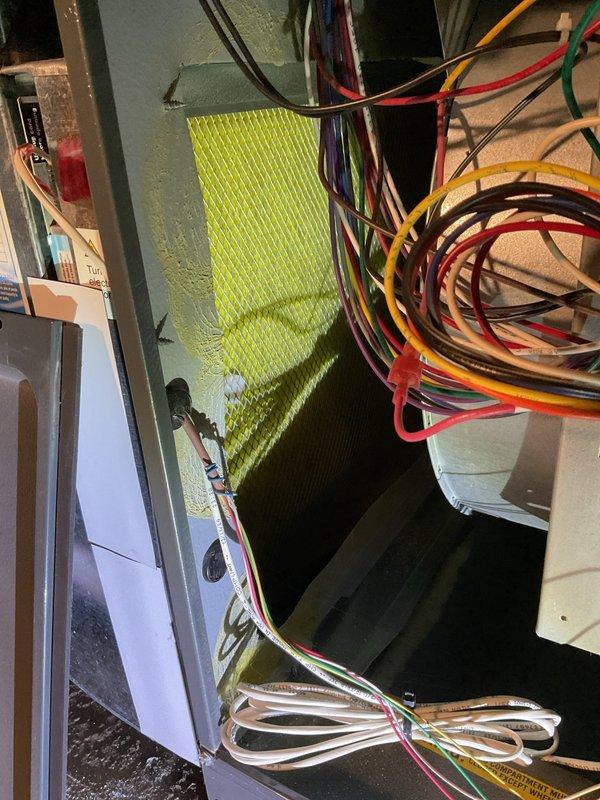 Performed scheduled heating maintenance on HVAC system. Inspected electrical connections, control board, and blower motor assembly, ensuring all wire harnesses were properly secured and functioning correctly. System was returned to service in good working condition.