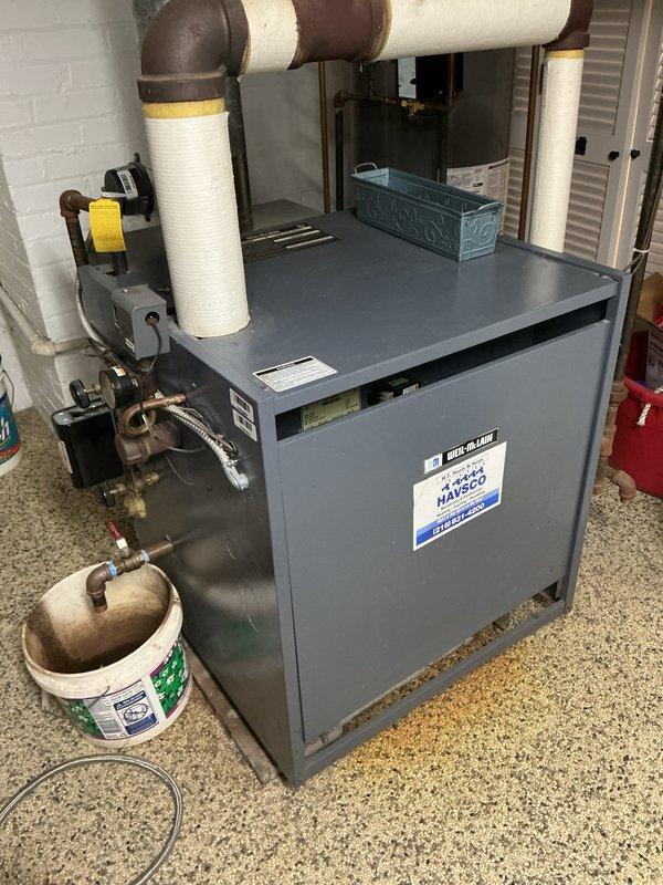 Completed scheduled maintenance service on Weil-McLain boiler system. Performed comprehensive inspection of copper heat exchanger tubes and associated piping. Cleaned components, checked all connections, and verified proper system operation during the 2-hour contract maintenance visit.